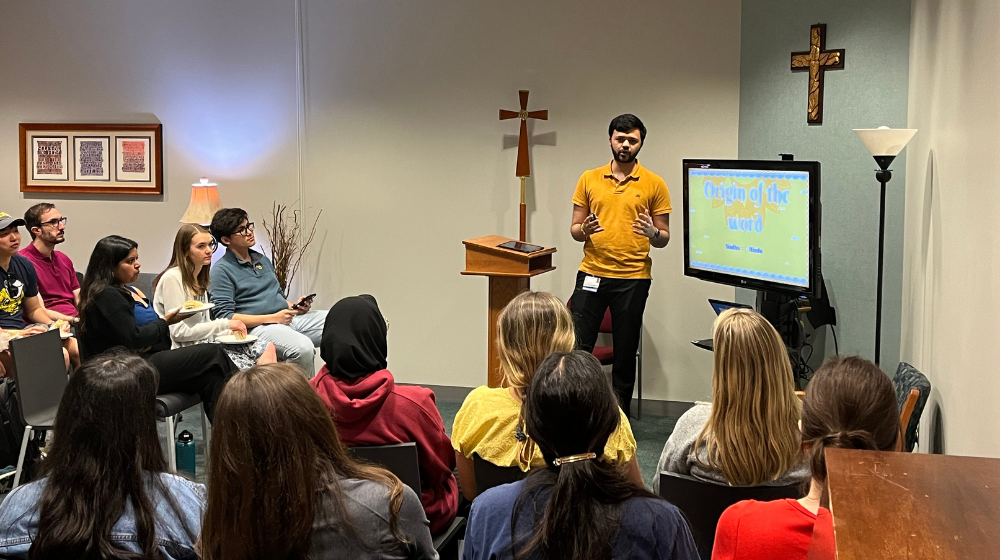 Students meet for interfaith dialogue in HSC Ministry's Gathering Room.